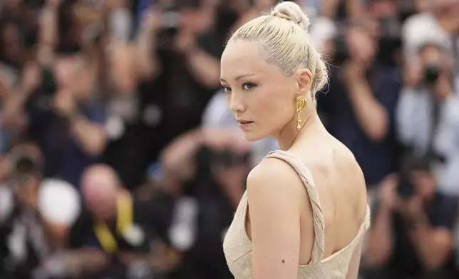 Pom Klementieff poses for photographers during the photo call for the film 'Mission: Impossible – The Final Reckoning' at the 78th international film festival, Cannes, southern France, Wednesday, May 14, 2025. (Photo by Scott A Garfitt/Invision/AP)