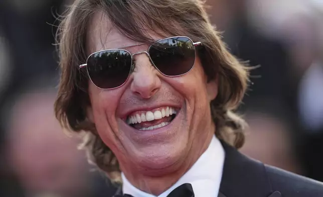 Tom Cruise poses for photographers upon arrival at the premiere of the film 'Mission: Impossible - The Final Reckoning' at the 78th international film festival, Cannes, southern France, Wednesday, May 14, 2025. (Photo by Scott A Garfitt/Invision/AP)