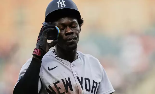 New York Yankees' Jazz Chisholm Jr. reacts after an injury during the first inning of a baseball game against the Baltimore Orioles, Tuesday, April 29, 2025, in Baltimore. (AP Photo/Stephanie Scarbrough)