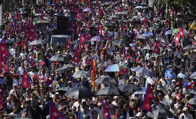 Pro-monarchy supporters take part in a rally calling for the restoration of Nepal's monarchy in Kathmandu, Nepal, Thursday, May 29, 2025. (AP Photo/Niranjan Shrestha)