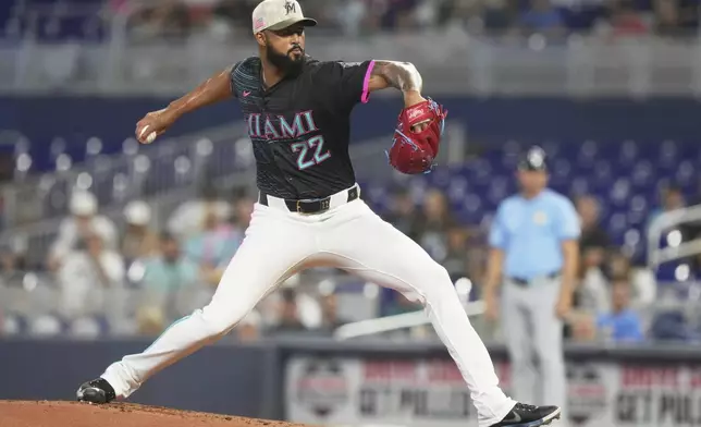 Miami Marlins pitcher Sandy Alcantara (22) aims a pitch during the second inning of a baseball game against the Tampa Bay Rays, Saturday, May 17, 2025, in Miami. (AP Photo/Marta Lavandier)
