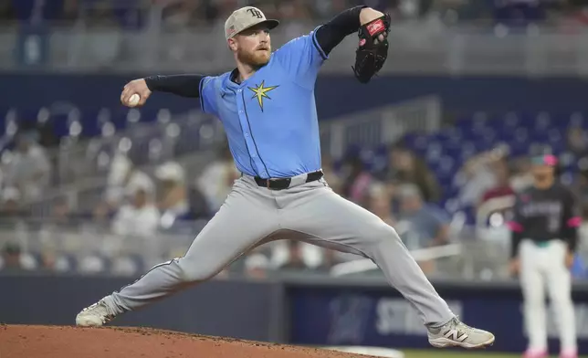 Tampa Bay Rays pitcher Drew Rasmussen (57) aims a pitch during the second inning of a baseball game against the Miami Marlins, Saturday, May 17, 2025, in Miami. (AP Photo/Marta Lavandier)