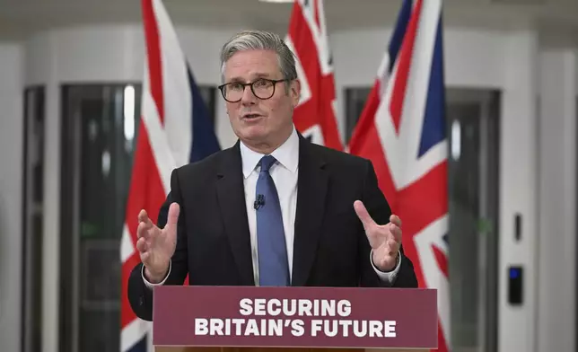 Britain's Prime Minister Keir Starmer speaks during a press conference at a military headquarters in north-west London, Thursday, May 22, 2025, following a deal on the Chagos Islands. (AP Photo/Thomas Krych, pool)
