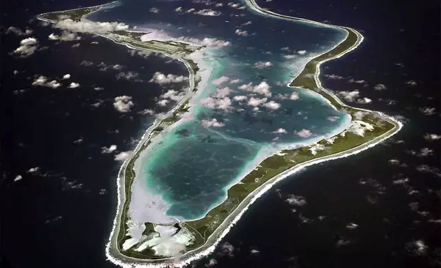 FILE - This image realeased by the U.S. Navy shows an aerial view of Diego Garcia. (U.S. Navy via AP, File)