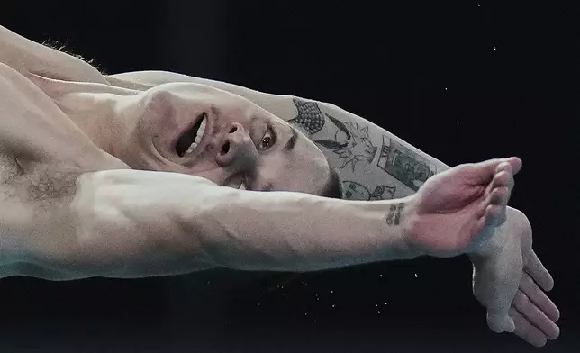 Cassiel Rousseau of Australia competes in the Men's 10m Platform event for the Diving World Cup Super Final held at the Water Cube, in Beijing, Sunday, May 4, 2025. (AP Photo/Andy Wong)