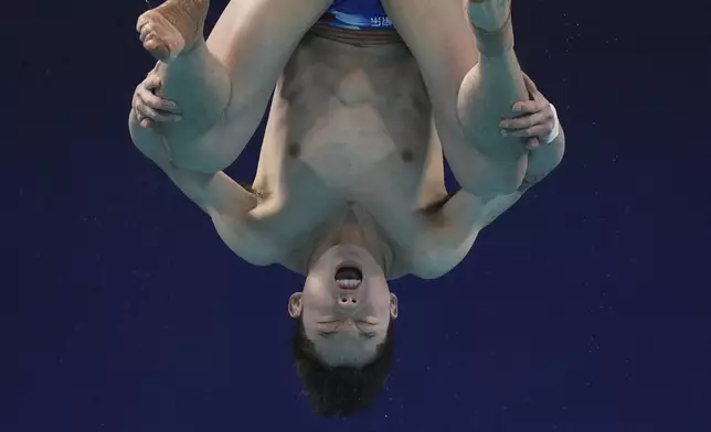 Wang Zongyuan of China competes in the Men's 3m Springboard event for the Diving World Cup Super Final held at the Water Cube in Beijing on Saturday, May 3, 2025. (AP Photo/Andy Wong)