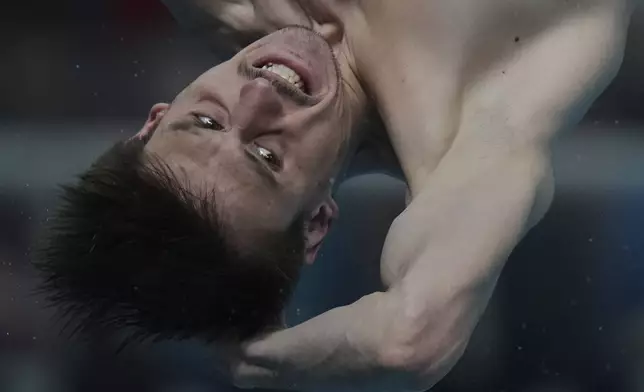 Gwendal Bisch of France competes in the Men's 3m Springboard event for the Diving World Cup Super Final held at the Water Cube in Beijing on Saturday, May 3, 2025. (AP Photo/Andy Wong)