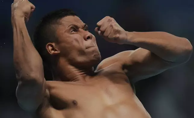 Luis Felipe Uribe Bermudez of Columbia competes in the Men's 3m Springboard event for the Diving World Cup Super Final held at the Water Cube in Beijing, Saturday, May 3, 2025. (AP Photo/Andy Wong)
