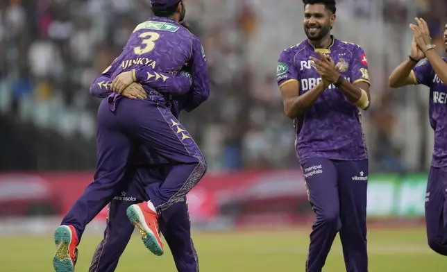 Kolkata Knight Riders' captain Ajinkya Rahane (3) celebrates with teammates after taking the catch to dismiss Rajasthan Royals' Vaibhav Suryavanshi during the Indian Premier League cricket match between Kolkata Knight Riders and Rajashtan Royals at Eden Gardens in Kolkata, India, Sunday, May 4, 2025. (AP Photo/Bikas Das)