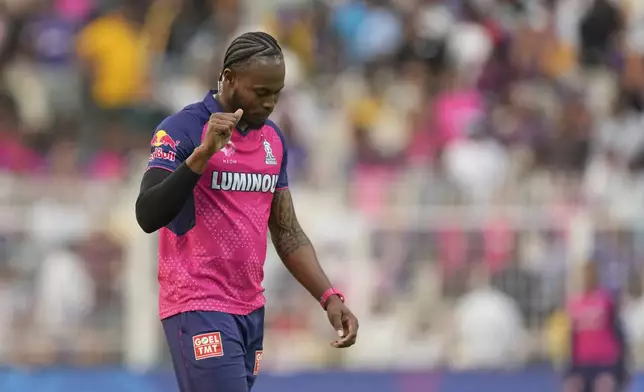 Rajasthan Royals' Jofra Archer celebrates the wicket of Kolkata Knight Riders' Angkrish Raghuvanshi during the Indian Premier League cricket match between Kolkata Knight Riders and Rajashtan Royals at Eden Gardens in Kolkata, India, Sunday, May 4, 2025. (AP Photo/Bikas Das)