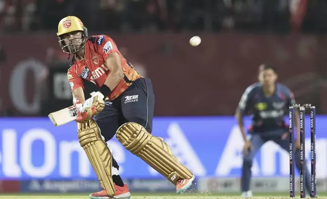 Punjab Kings' Shashank Singh bats during the Indian Premier League cricket match between Lucknow Super Giants and Punjab Kings at Himachal Pradesh Cricket Association Stadium in Dharamshala, India, Sunday, May 4, 2025. (AP Photo/Ashwini Bhatia)