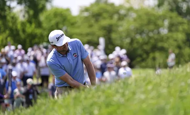 Keegan Bradley hits on the tenth hole during the first round of the Truist Championship golf tournament at the Philadelphia Cricket Club, Thursday, May 8, 2025, in Flourtown. (AP Photo/Matt Rourke)