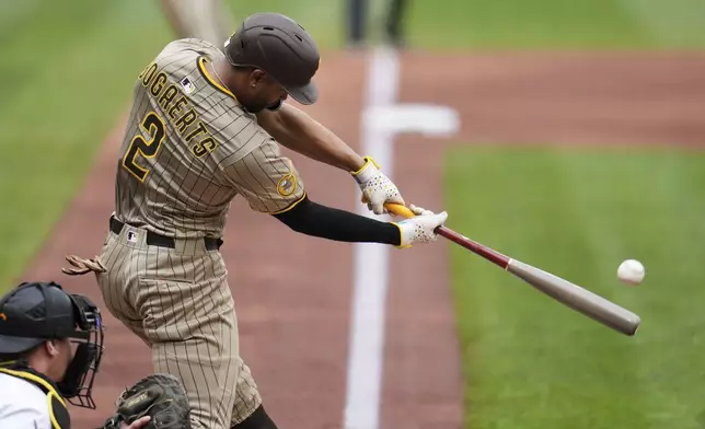 San Diego Padres' Xander Bogaerts (2) doubles off Pittsburgh Pirates pitcher Andrew Heaney, driving in two runs, during the second inning of a baseball game in Pittsburgh, Sunday, May 4, 2025. (AP Photo/Gene J. Puskar)