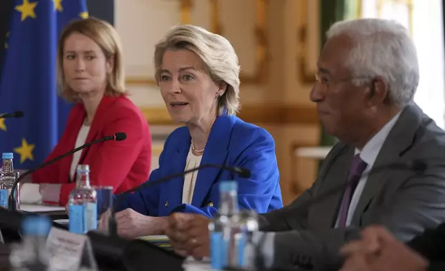 European Commission President Ursula von der Leyen, center, speaks during a meeting between the U.K. and the European Union to discuss closer ties in their first official summit since Brexit, in London, Monday, May 19, 2025.(AP Photo/Kin Cheung, Pool)