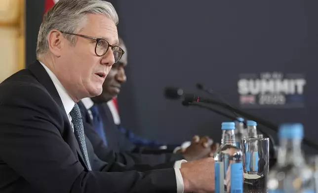 Britain's Prime Minister Keir Starmer speaks during a meeting between the U.K. and the European Union to discuss closer ties in their first official summit since Brexit, in London, Monday, May 19, 2025.(AP Photo/Kin Cheung, Pool)