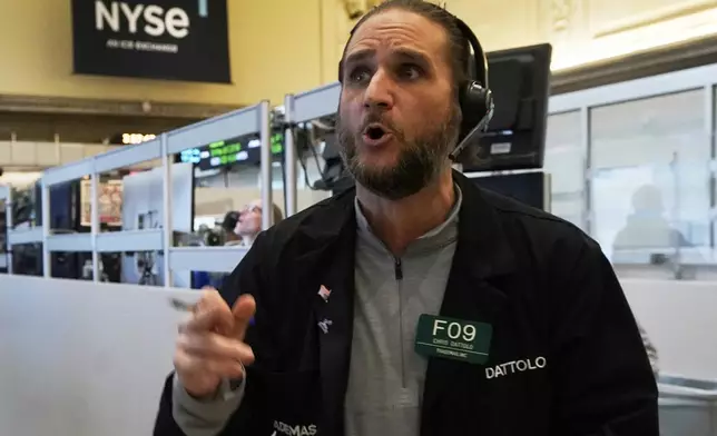 Options trader Chris Dattollo works on the floor of the New York Stock Exchange, Monday, May 12, 2025. (AP Photo/Richard Drew)