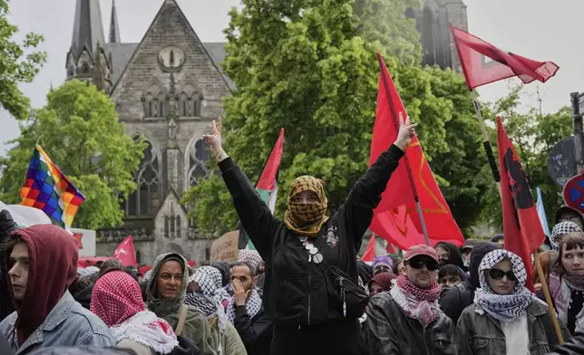 People attend a pro-Palestinians demonstration to commemorate the Nakba Day in Berlin, Germany, Thursday, May 15, 2025. (AP Photo/Ebrahim Noroozi)