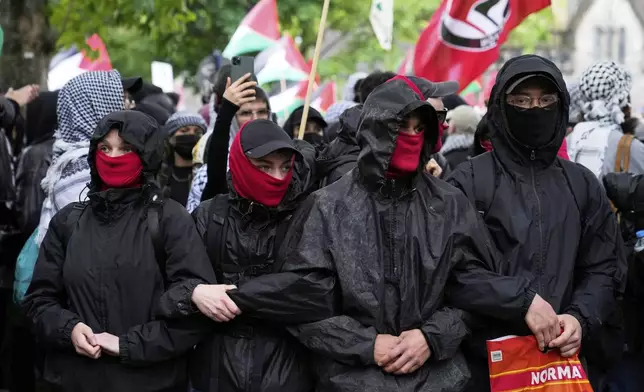 People attend a pro-Palestinians demonstration to commemorate the Nakba Day in Berlin, Germany, Thursday, May 15, 2025. (AP Photo/Ebrahim Noroozi)