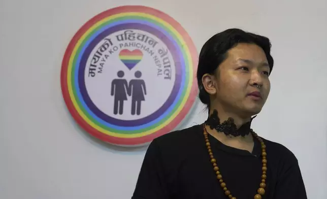 Babu Dumi Rai, who works at Mayako Pahichan Nepal, an organization working for the rights of LGBTIQ+ individuals, speaks to The Associated Press, in Kathmandu, Nepal, Thursday, March 20, 2025. (AP Photo/Niranjan Shrestha)