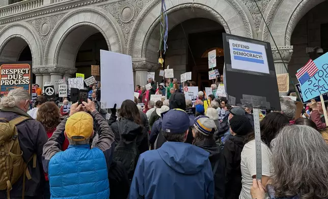 Supporters of Judge Hannah Dugan protest outside the United States Federal Building and Courthouse in Milwaukee, Wis. on Thursday, April 15, 2025 ahead of Dugan's arraignment on charges that she helped a man in the country illegally evade arrest by immigration authorities. (AP Photo/Todd Richmond)