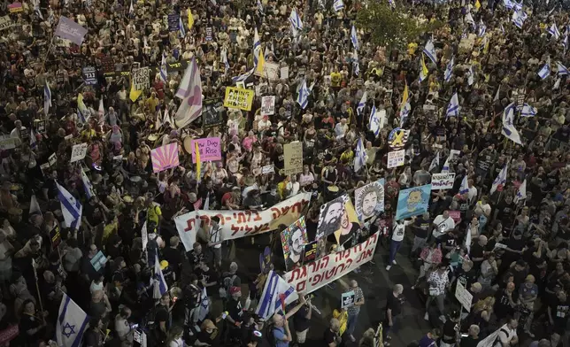 People take part in a protest demanding the end of the war and immediate release of hostages held by Hamas in the Gaza Strip, and and against Prime Minister Benjamin Netanyahu's government in Tel Aviv, Israel, Saturday, May 17, 2025.(AP Photo/Maya Alleruzzo)