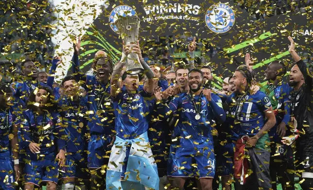 Chelsea's Enzo Fernandez lifts the trophy after the Europa Conference League final soccer match between Real Betis and Chelsea in Wroclaw, Poland, Wednesday, May 28, 2025. (AP Photo/Czarek Sokolowski)