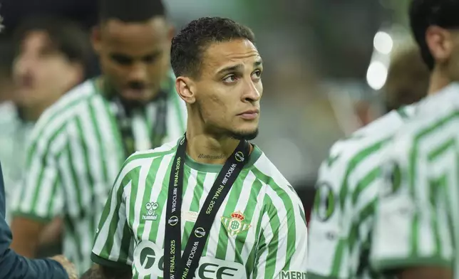 Betis' Antony walks off the podium after they lost the Europa League final soccer match between Real Betis and Chelsea in Wroclaw, Poland, Wednesday, May 28, 2025. (AP Photo/Petr David Josek)