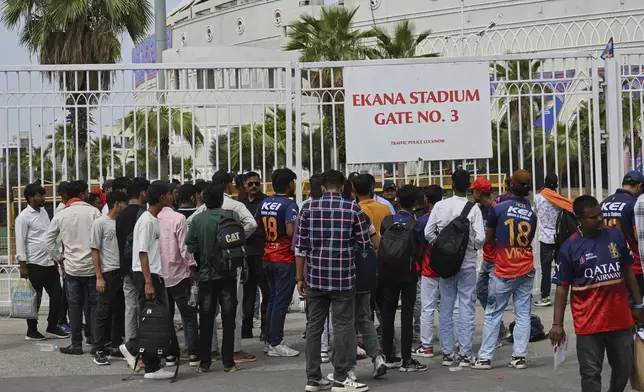 Fans gather outside Atal Bihari Vajpayee Ekana Cricket Stadium after organizers suspended the Indian Premier League for one week following the escalating military tensions with Pakistan, in Lucknow, India, Friday, May 9, 2025. (AP Photo)