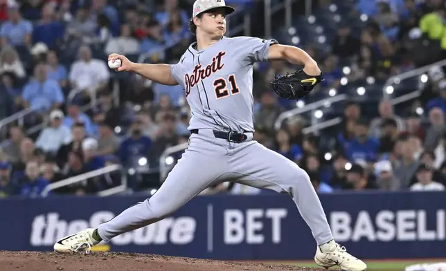 Detroit Tigers starting pitcher Jackson Jobe throws to a Toronto Blue Jays batter in first-inning baseball game action in Toronto, Sunday, May 18, 2025. (Jon Blacker/The Canadian Press via AP)