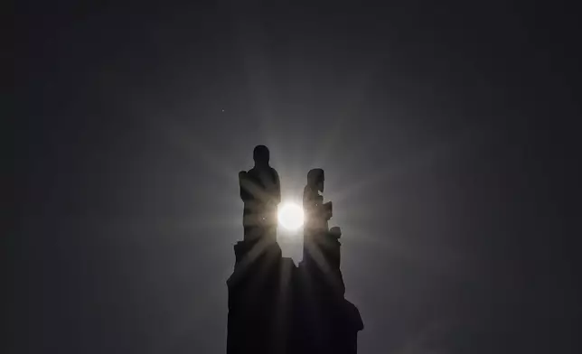 Remains of the former Urakami Cathedral wall," a preserved section of the original cathedral destroyed in the atomic bombing on August 9, 1945, are seen in Nagasaki, southern Japan, Saturday, April 26, 2025. (AP Photo/Eugene Hoshiko)