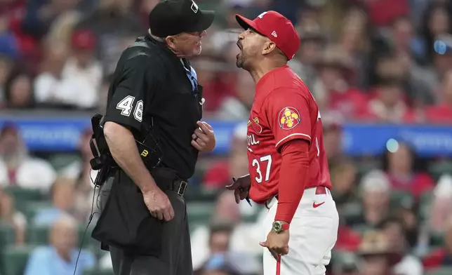 St. Louis Cardinals manager Oliver Marmol argues after being ejected by home plate umpire Ron Kulpa, left, during the fourth inning of a baseball game against the Arizona Diamondbacks Friday, May 23, 2025, in St. Louis. (AP Photo/Jeff Roberson)