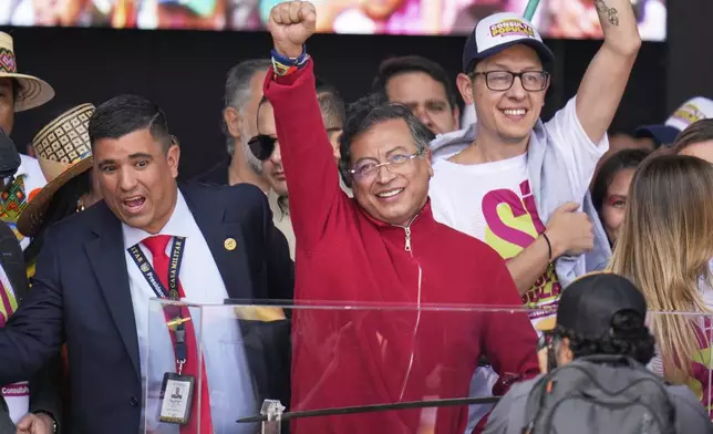 President Gustavo Petro addresses supporters outside Congress in Bogotá, Colombia, Thursday, May 1, 2025, before presenting questions for a referendum on his labor reform proposal to the Senate after two failed attempts in the legislature. (AP Photo/Fernando Vergara)
