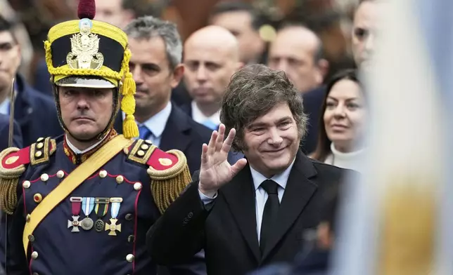 President Javier Milei arrives to a Mass to mark the anniversary of the formation of Argentina's first independent government in Buenos Aires, Argentina, Sunday, May 25, 2025. (AP Photo/Gustavo Garello)