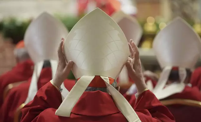 Cardinals attend a mass on the fifth of nine days of mourning for late Pope Francis, in St. Peter's Basilica at the Vatican, Wednesday, April 30, 2025. (AP Photo/Alessandra Tarantino)