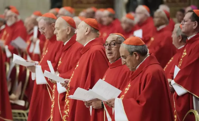 Cardinals nattend a mass on the sixth of nine days of mourning for late Pope Francis, in St. Peter's Basilica at the Vatican, Thursday, May 1, 2025. (AP Photo/Gregorio Borgia)