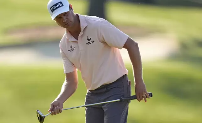Harris English reacts after missing a putt on the 10th hole during the first round of the PGA Championship golf tournament at the Quail Hollow Club, Thursday, May 15, 2025, in Charlotte, N.C. (AP Photo/George Walker IV)