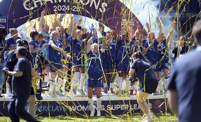 Chelsea lift the Women's Super League trophy at Stamford Bridge, London, Saturday May 10, 2025. (Rhianna Chadwick/PA via AP)