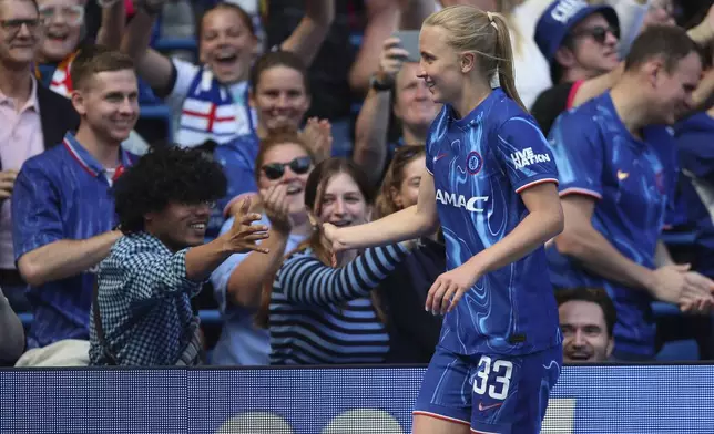 Chelsea's Aggie Beever-Jones celebrates scoring during the Women's Super League soccer match between Chelsea and Liverpool at Stamford Bridge, London, Saturday May 10, 2025. (Rhianna Chadwick/PA via AP)