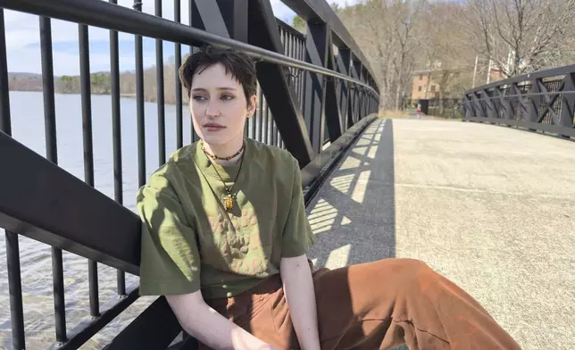 Julia Dupuis, one of 61 activists indicted on racketeering charges in connection with Atlanta's "Stop Cop City" movement, poses for a portrait in Worcester, Mass., on April 14, 2025. (AP Photo/Rodrique Ngowi)
