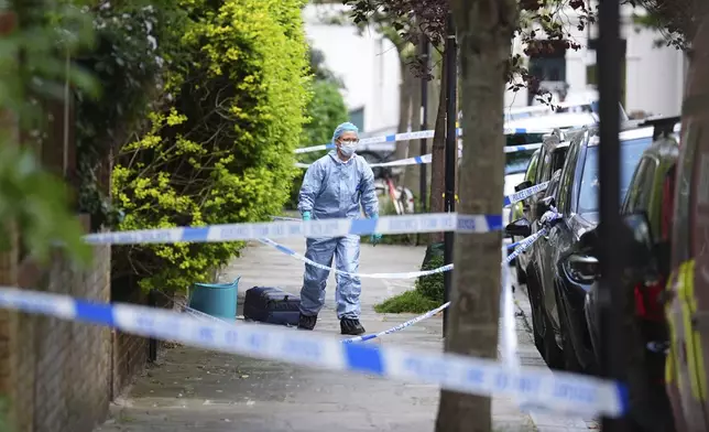 A police cordon is seen in Kentish Town, near British Prime Minister Keir Starmer's house in north London, Monday, May 12, 2025. (James Manning/PA via AP)