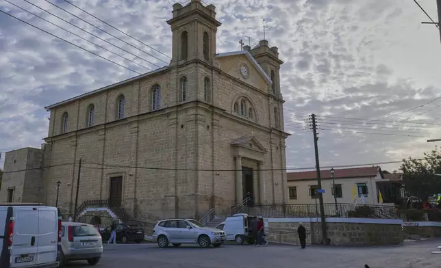 St. George Church in the Maronite village of of Kormakitis in the breakaway north of the ethnically divided Cyprus on Wednesday, April 23, 2025. (AP Photo/Petros Karadjias)