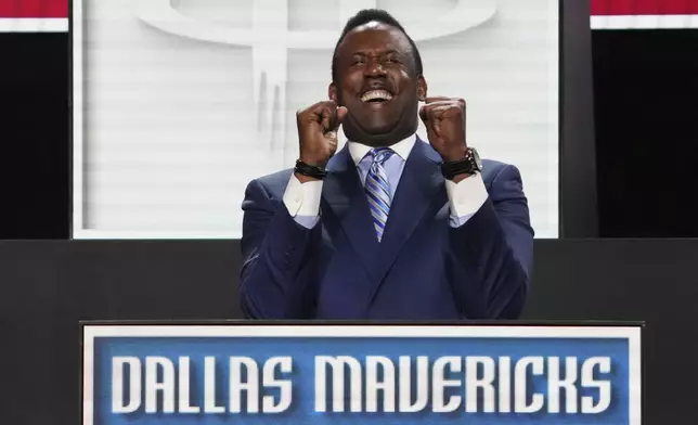 Dallas Mavericks' Rolando Blackman celebrates after NBA Deputy Commissioner Mark Tatum announced that the Mavericks won the first pick in the NBA basketball draft lottery in Chicago, Monday, May 12, 2025. (AP Photo/Nam Y. Huh)