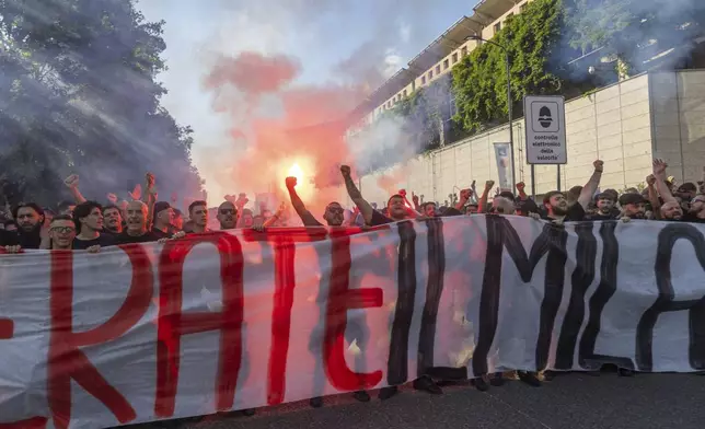 AC Milan fans hold a protest in the square of the Portello area of Milan, Italy near the club's headquarters on Saturday, May 24, 2025. (Stefano Porta/LaPresse via AP)
