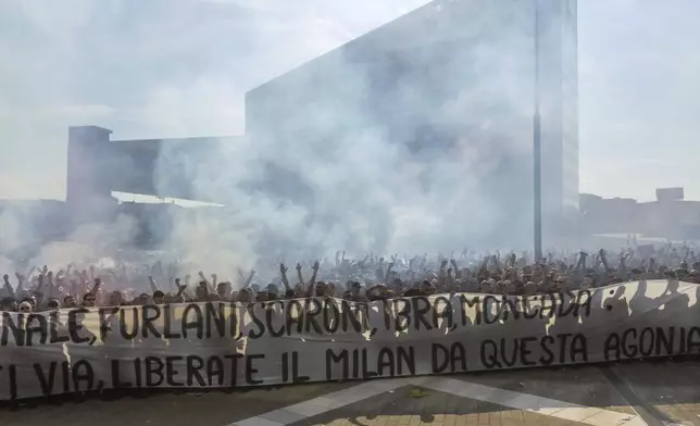 AC Milan fans hold a protest in the square of the Portello area of Milan, Italy near the club's headquarters on Saturday, May 24, 2025. (Stefano Porta/LaPresse via AP)