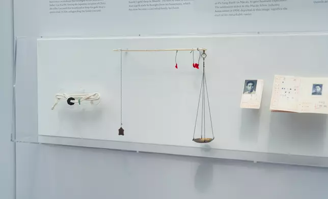 In his early business ventures, Dr. Lee employed good assay techniques learned at his family's gold shop in Shunde, using a gold scale (Center) brought from his hometown — now a treasured family heirloom. A cherished Lee family heirloom, this waistband (Left) was worn by Dr. Lee’s father, Lee Kai Po, who, during the Japanese invasion of China, secured the gold shop's assets within it, preserving the family’s wealth.