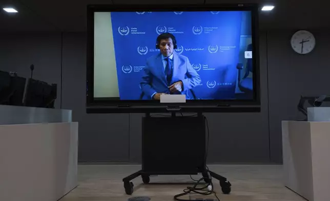 FILE - Former Philippine President Rodrigo Duterte is seen on a screen in the courtroom of the International Criminal Court (ICC) in The Hague, Netherlands, March 14, 2025. (AP Photo/Peter Dejong, Pool, file)