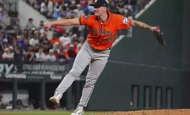Houston Astros starting pitcher Hunter Brown throws during the fourth inning of a baseball game against the Texas Rangers, Thursday, May 15, 2025, in Arlington, Texas. (AP Photo/LM Otero)