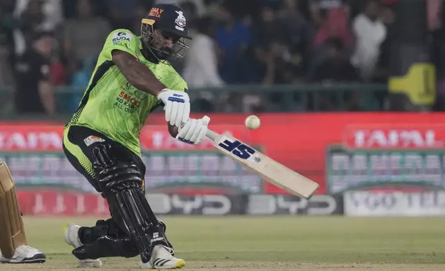Lahore Qalandars' Kusal Perera plays a shot during the Pakistan Super League Twenty20 final cricket match between Quetta Gladiators and Lahore Qalandars, in Lahore, Pakistan, Sunday, May 25, 2025. (AP Photo/K.M. Chaudary)