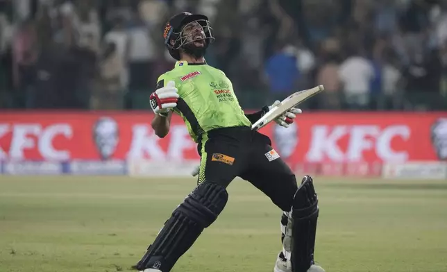 Lahore Qalandars' Sikandar Raza celebrates after winning the Pakistan Super League Twenty20 final cricket match against Quetta Gladiators, in Lahore, Pakistan, Sunday, May 25, 2025. (AP Photo/K.M. Chaudary)