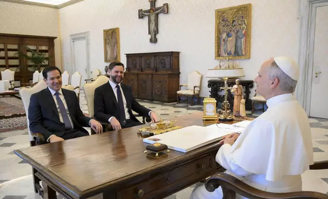 Pope Leo XIV meets with Vice President JD Vance, center, and Secretary of State Marco Rubio, left, on the occasion of their meeting at the Vatican, Monday, May 19, 2025. (Vatican Media via AP)